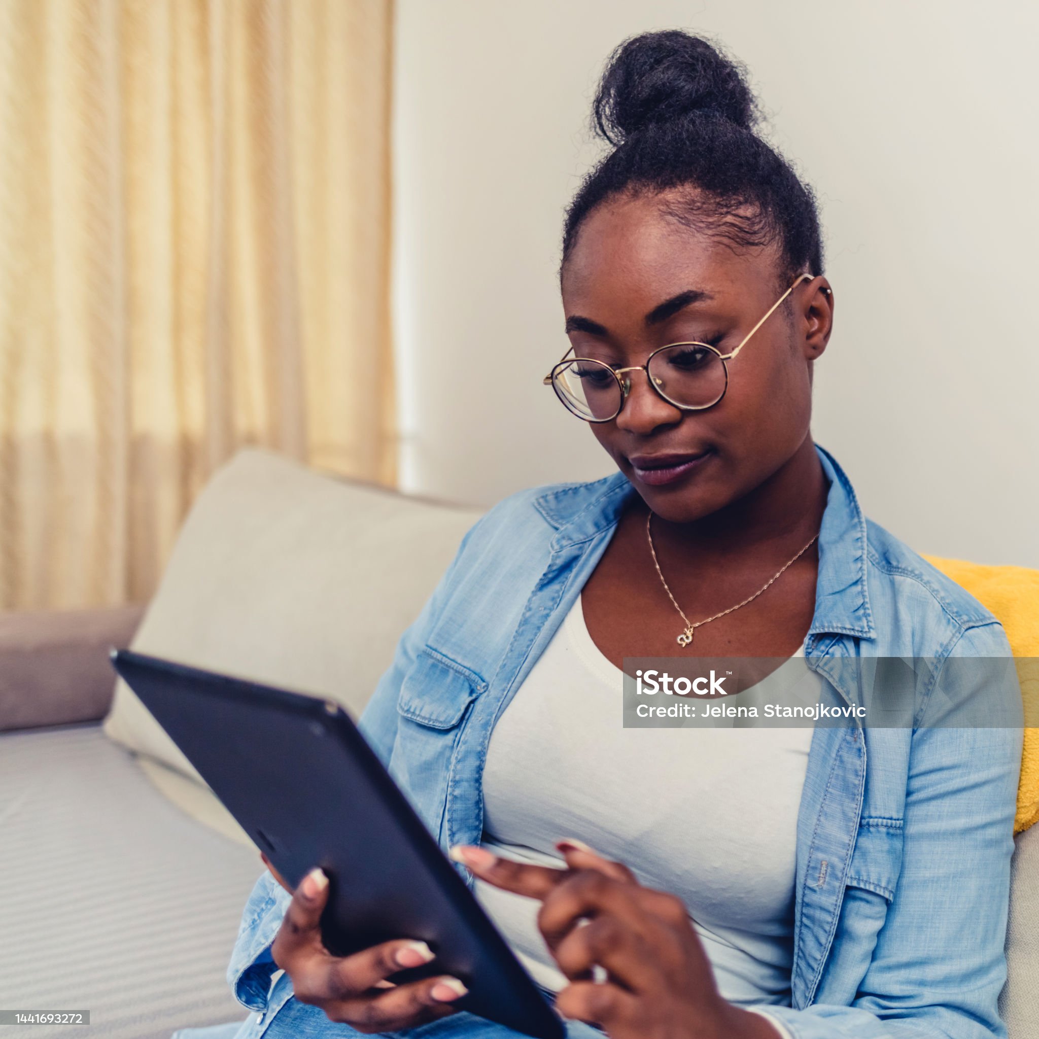 woman working on tablet